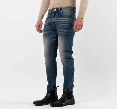 Jeans con sfumature effetto sabbiato