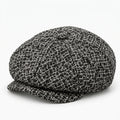 Schiebermütze aus Bouclé-Wolle - Schwarz